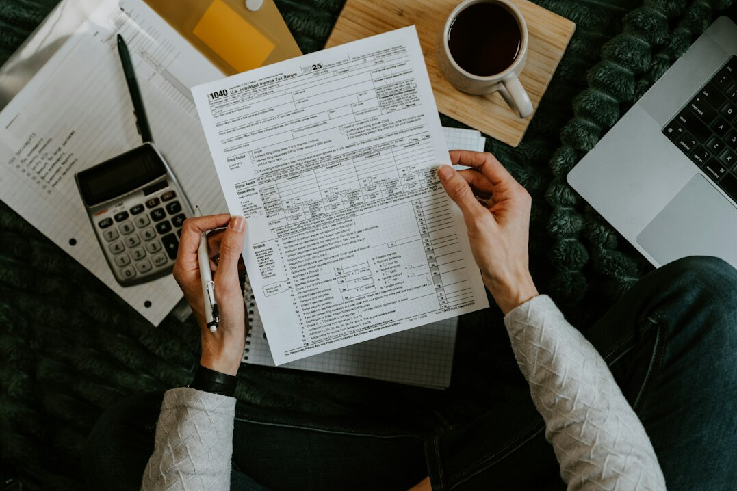person budgeting at home