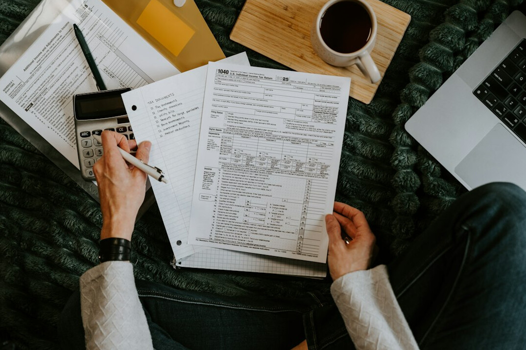 person reviewing budget spreadsheet