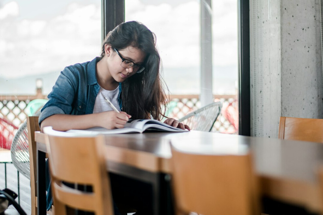 person studying finance books