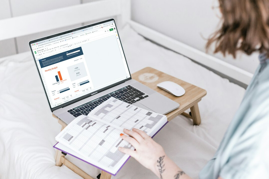 person reviewing budget spreadsheet